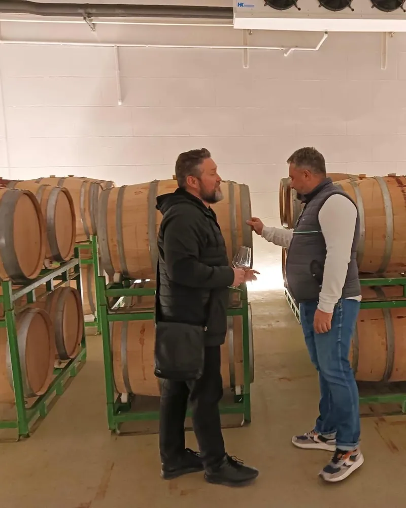 Checking oak barrels at a winery we work with